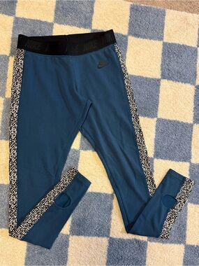 Nike Teal Leggings with Black Waistband & Patterned Side Stripes